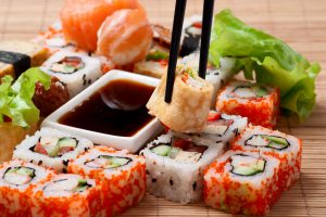 Traditional Japanese food Sushi. Closeup japanese sushi on a bamboo napkin. Sushi collection